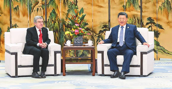 習近平會見國際奧林匹克委員會主席巴赫